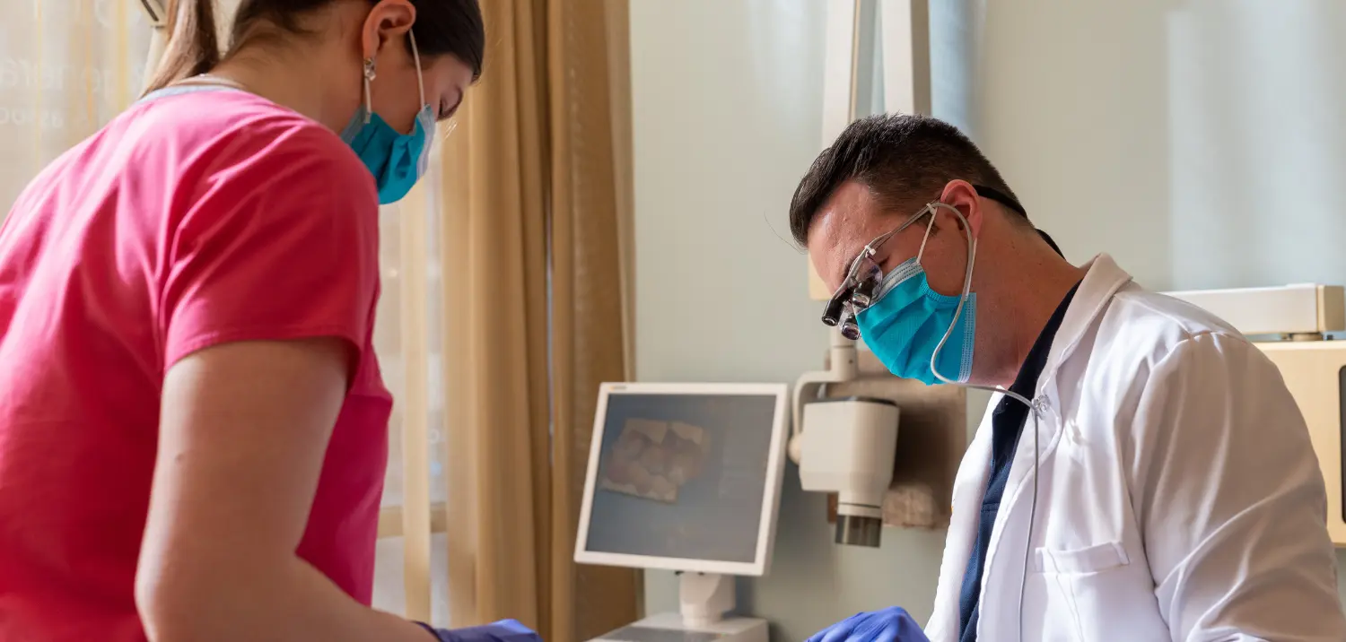 Dr. Anast treating an emergency patient